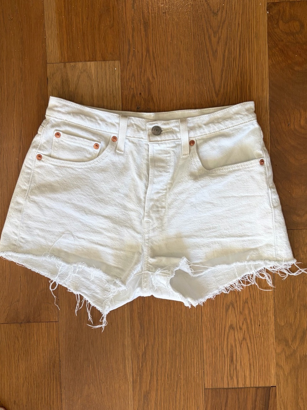 Levi's White Denim Frayed Hem Cutoff Shorts